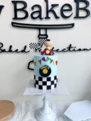 Owen's Baby Boy Sitting on Red Car Cake