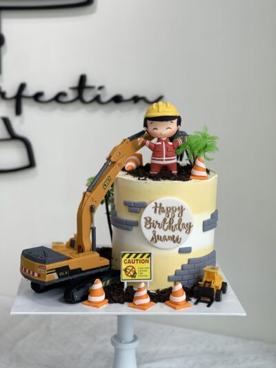 Little Boy on Construction Cake