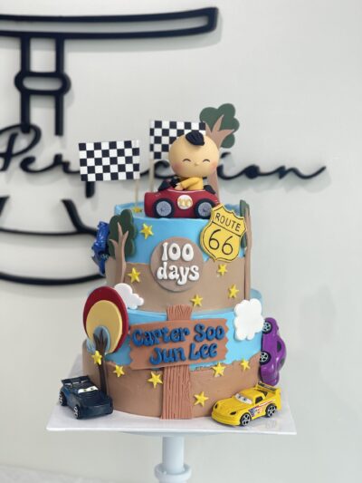 Carter Soo's 2-Tier Baby Boy Sitting in Car Cake