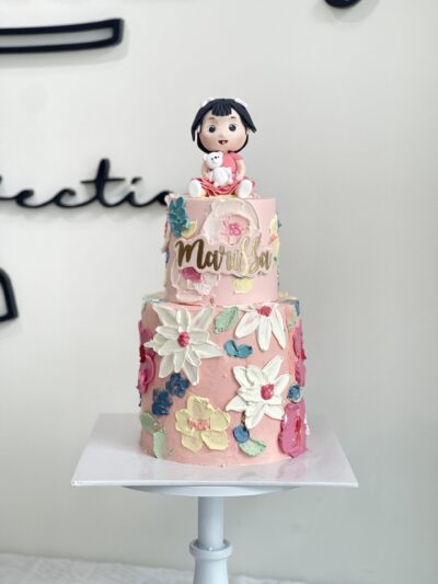 Marissa's 2-Tier Baby Girl on Flower Cake