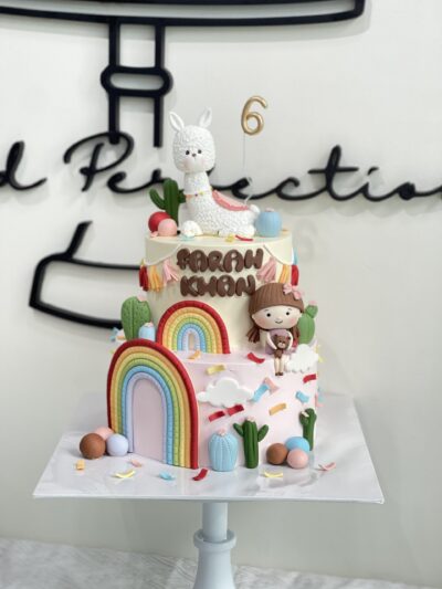 Farah Khan's 2-Tier Llama with Rainbow and Baby Girl Cake