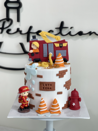 Luth Ezra's Fireman and Firetruck Cake