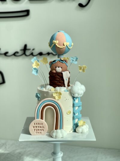 Aariz Mikhail's Bear in Hot Air Balloon and Rainbow Cake