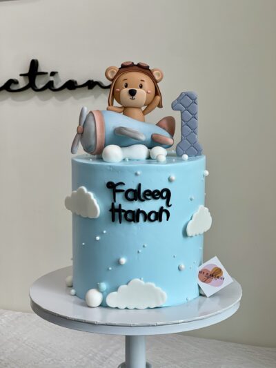 Faleeq Hanan's Bear on Airplane Cake